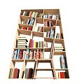 Modern Bookcase Design With Multiple Shelves And Various Sized Compartments Filled With Books
