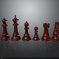 Red Chess Pieces Polished Wooden Set On Black Reflective Surface