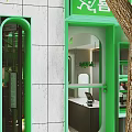 Green Tram Converted Restaurant Interior with Spiral Staircase Bar Counter and Seated Customers