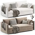 Gray And White Sofa Design With Striped Blankets Pillows And Decorative Balls