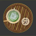 Wooden Tray Holding Drink with Straw and Patterned Teacup on Small Saucer