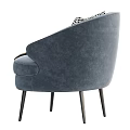 Beige Accent Chair with Black White Houndstooth Cushion and Brown Throw on Black Slender Legs