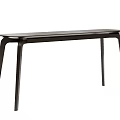 Modern Sleek Dark Colored Dining Table With Curved Legs And Minimalist Design