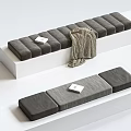 Soft Gray Cushions With Knitted Blanket And Books On White Platform
