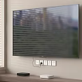 Wall Mounted TV in Living Room Featuring City Greenery View and Devices Below Window Blinds