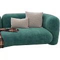Teal Curved Velvet Sofa with Gray Pillows and Plaid Blanket in Modern Living Room