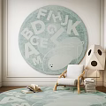 Round Rug With Alphabet Pattern In Cozy Room With Chair And Floor Lamp