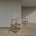 Minimalist Single Wooden Chair in Light Colored Interior with Wooden Floor and Natural Light