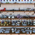 Vibrant Dinnerware Set Display on Shelves with Floral Tiles and Assorted Bowls Plates Cups