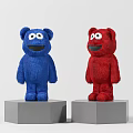 Blue and Red Bear Shaped Plush Toys Standing on Gray Hexagonal Pedestals