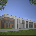 Modern Industrial Factory Building With Metal Exterior Large Windows And Green Lawn