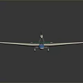 White Model Airplane With Long Wings Red Green Tail And Blue Cockpit