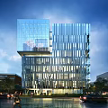 Modern High Rise Office Building With Glass Curtain Wall Metal Stripes Lighting And Trees