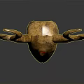 Golden Decorative Animal Skull with Curved Horns and Red Gemstone on Forehead