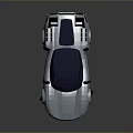 Silver Sleek Sports Car With Blue Windows Rear Spoiler And Modern Aerodynamic Design