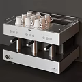 Sleek Modern Stainless Steel Coffee Machine With Drip Tray Holding White Cups