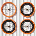 Four Modern Orange And Black Clocks Hanging On White Striped Wall
