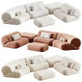 Modern Modular Sectional Sofa With Neutral Blush Tones Throw Pillows And Ottoman