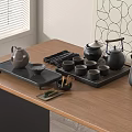 Minimalist Black Tea Set With Teapot Cups And Tray On Wooden Table
