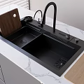 Black Double Bowl Kitchen Sink With Modern Faucet And Wooden Cutting Boards On Marble Countertop