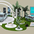 Floral Installation Display With Greenery White Arch Structures Circular Platform And Thatch Umbrella