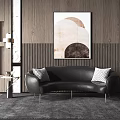 Black Sectional Sofa With Gold Legs And Geometric Pillows In Modern Interior With Wooden Wall And Abstract Painting