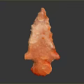 Orange Arrow Shaped Wooden Stone Decor With Gray Background And Reflective Surface