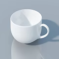 White Ceramic Cup On Gray Surface With Reflection And Shadow