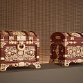 Two Dark Red Chests With Intricate Golden Decorations Against Brown Grid Patterned Wall 3d model