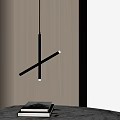 Modern Black Cross Design Pendant Light in Interior with Wooden Wall and Stack of Books