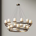 Multi Tiered Chandelier With Candle Shaped Lights And Brass Metal Frame Hanging In Minimalist Interior