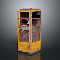 Vintage Yellow and Red Telephone Booth With Glass Windows and Aged Metal Frame