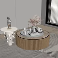 Round Ribbed Wooden Coffee Table With Pampas Grass Tea Set And Books On Geometric Rug