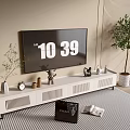 Modern White TV Stand With TV Decorative Clock Vase And Potted Plant On Rug
