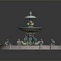 Ornate Multi Tiered Fountain With Turquoise Gold Accents And Statues On Circular Base