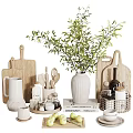 Stylish Kitchenware Collection With Wooden Cutting Boards Green Plant White Vase and Metal Basket