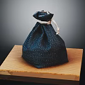 Dark Blue Fabric Bag On Wooden Platform Practical Household Storage Item