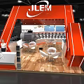 JLEM Red Exhibition Booth With Modern Geometric Design Display Area And Interior Lighting