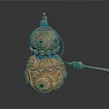 Golden Gourd Shaped Sculpture Featuring Intricate Patterns Green Gemstones And Decorative Details