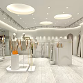 Modern Fashion Clothing Store With Glass Window Displays Mannequins And Green Plants