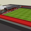 Football Stadium Surrounded by Red Running Track With Grandstand Floodlights Green Grass And Trees