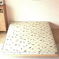 Comfortable Mattress With Diamond Quilted Leaf Print On Wooden Floor And Cabinet