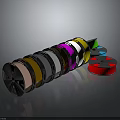 Colored Adhesive Tape Rolls In Various Shades Arranged On Reflective Surface