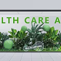 Health Care Area Window Display With Green Plants Balloons And Signage