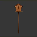 Wooden Birdhouse With Red Roof And Platform Base On Wooden Pole