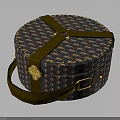 Round Patterned Clothing Storage Bag With Brown Straps Gold Buckles And Handheld Design