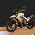 White and Orange Adventure Motorcycle with Modern Design Windshield and Black Accents