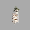 Stylish Multi tiered Shelf With Green Plant Pink Flowers White Vase Bowl Mugs And Wicker Basket