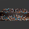 Delicious Layered Chocolate Cake With Chocolate Decorations And Colorful Sprinkles