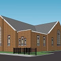 Historic Brick Building Featuring Gabled Roof Arched Windows And Black Fence